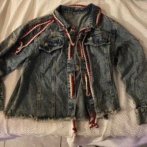 Denim jacket (no brand or size) fits over size for small to medium